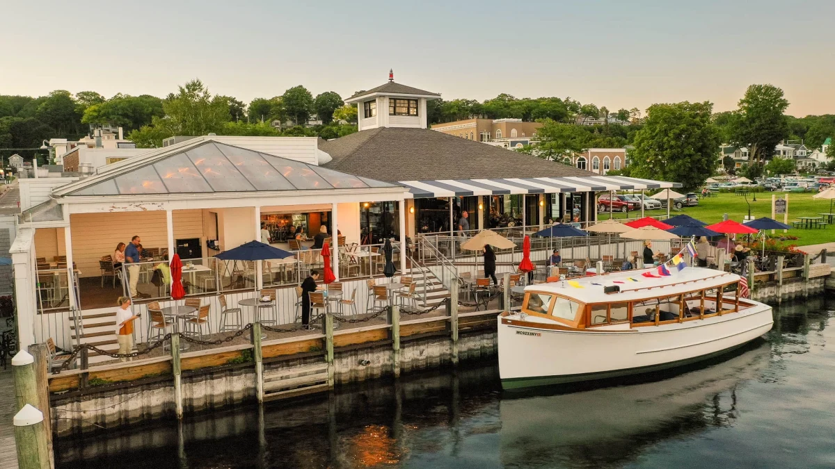 Aerial view of the restaurant's deck and cupola with the Pointer boat moored alongside