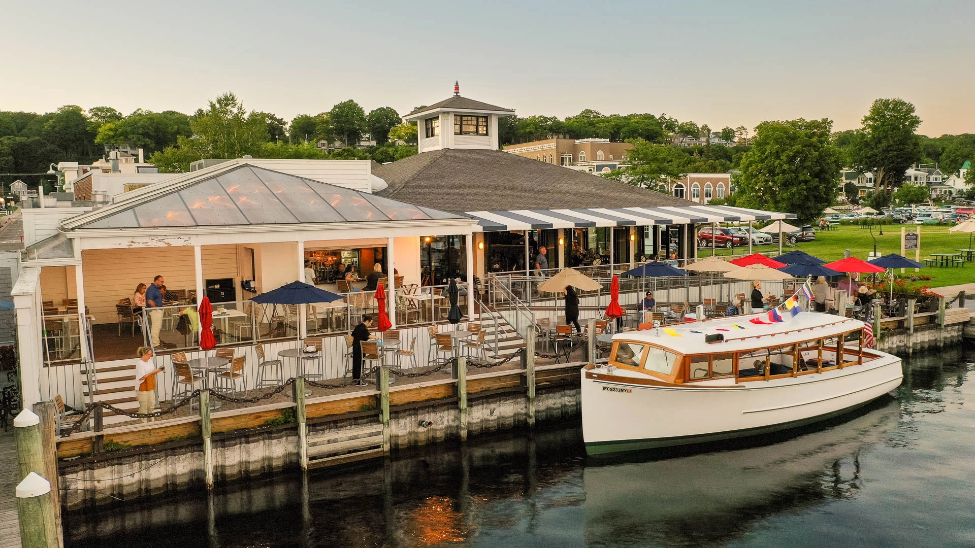 Aerial view of the restaurant's deck and cupola with the Pointer boat moored alongside